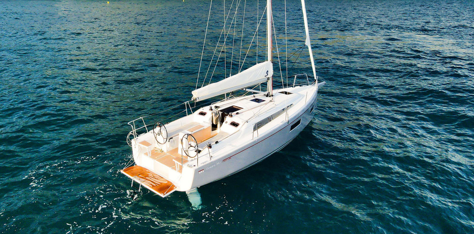 Interior view of Beneteau yacht with seating and table