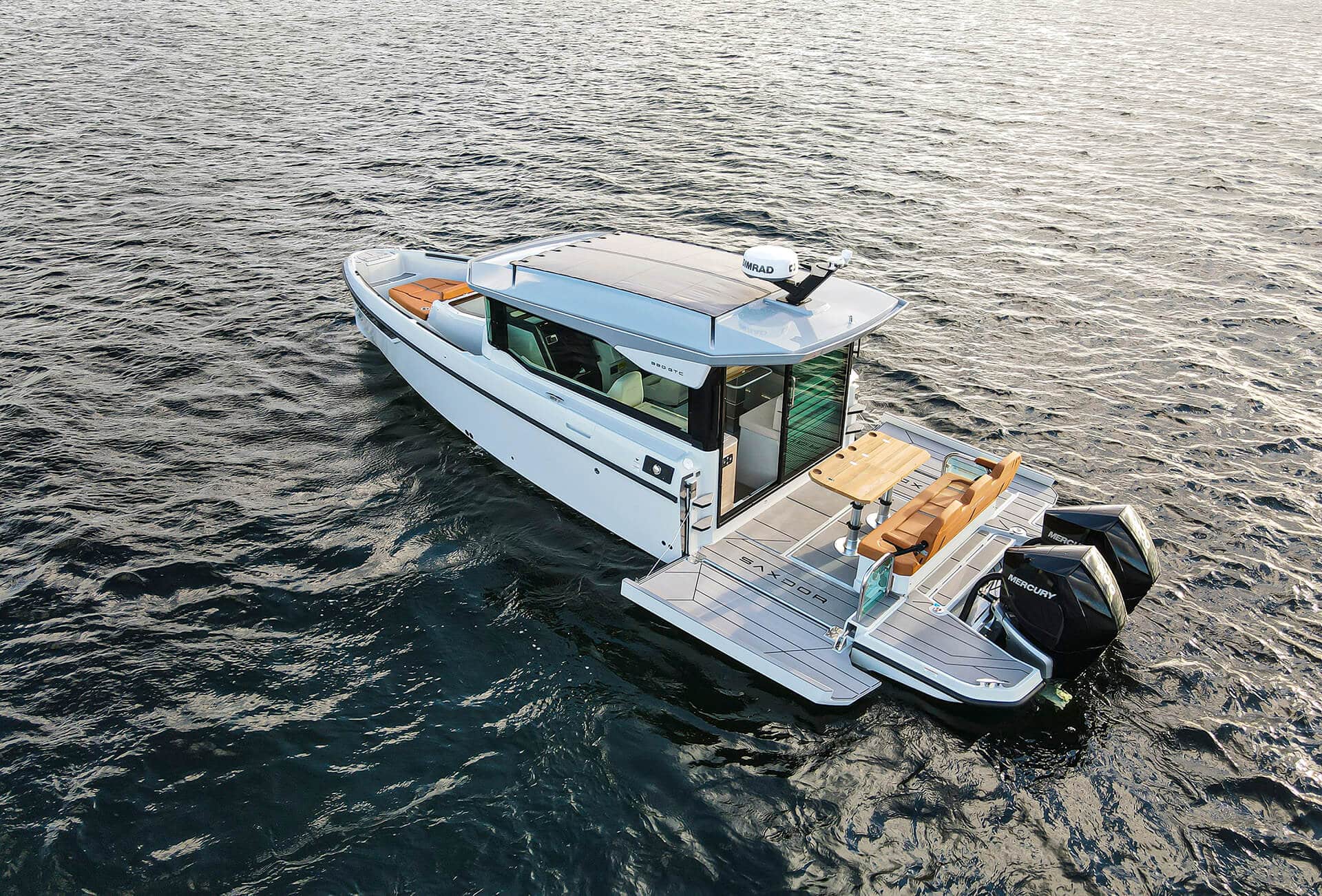 Saxdor 320 GTC boat on the water